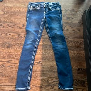 Dark with white stitching True Religion jeans. Lower waist. Size 27